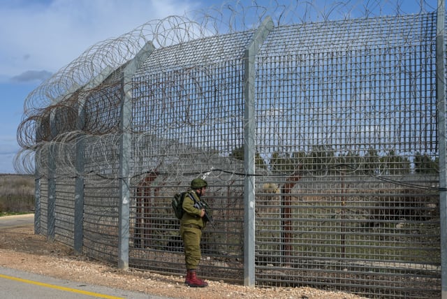  Israeli soldiers patrol the area following this morning's border incident at the border fence with Syria, in southern Golan Heights, on January 29, 2023.  (photo credit: MICHAEL GILADI/FLASH90)