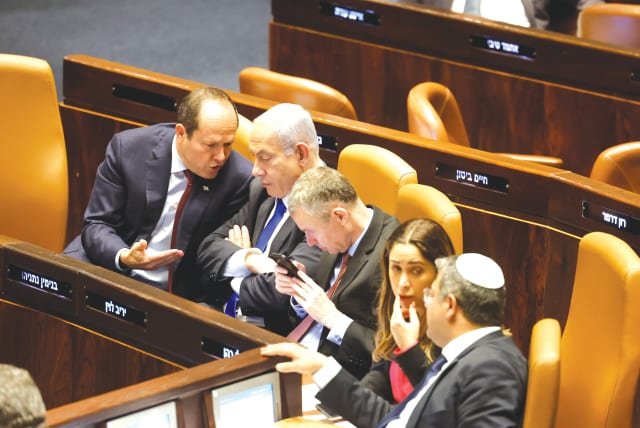  PRIME MINISTER Benjamin Netanyahu and members of his coalition are deep in discussion in the Knesset this week. (photo credit: MARC ISRAEL SELLEM)