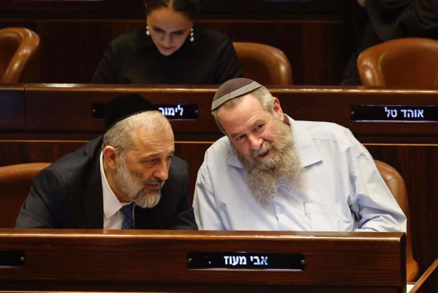  Noam party leader Avi Maoz sits with Shas leader Arye Deri in the Knesset plenum, March 1, 2023 (photo credit: MARC ISRAEL SELLEM/THE JERUSALEM POST)