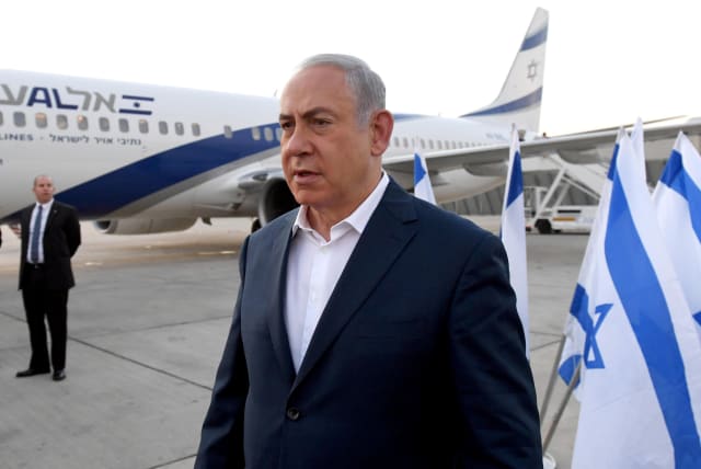  Prime Minister Benjamin Netanyahu departs on his flight to Kenya from the Ben Gurion Airport in Tel Aviv, on November 28, 2017 (photo credit: HAIM ZACH/GPO)