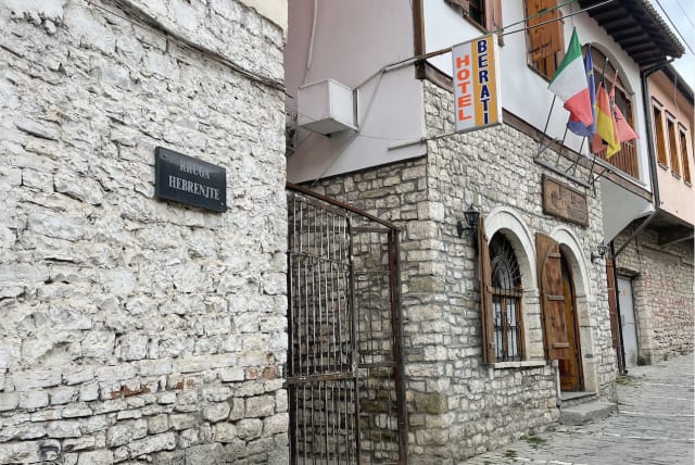  A sign in Berat, Albania, reads Rruga Hebrentje, or Jew Street. (photo credit: NAOMI TOMKY/JTA)