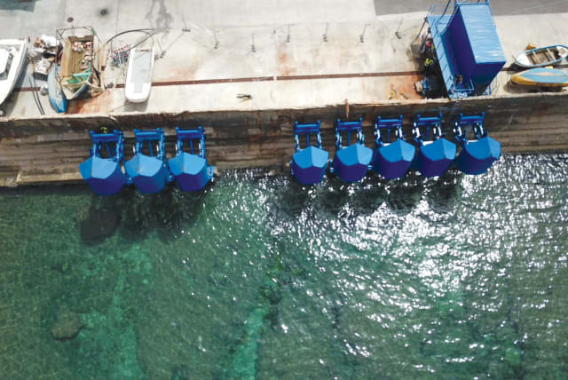  Floaters off the breakwater at Jaffa Port. (photo credit: Eco Wave Power)