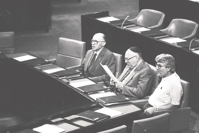  LEFT TO right: Then-prime minister Menachem Begin sits in the Knesset plenum alongside cabinet ministers Yosef Burg and David Levy, in 1983. The Right’s stunning victory in 1977 caused immense fear and alarm on the Left (photo credit: YOSSI ZAMIR/FLASH90)