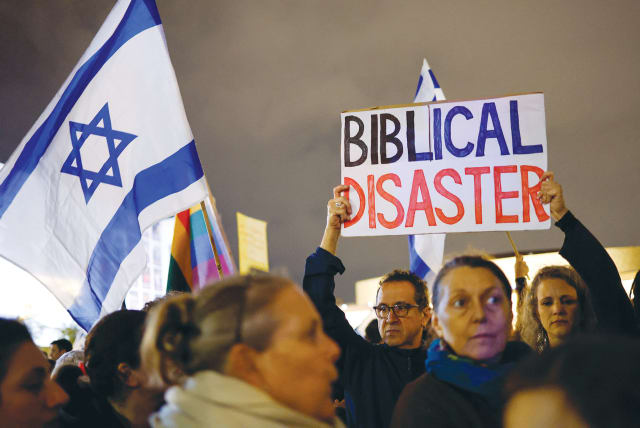  PROTESTERS ATTEND a demonstration in Tel Aviv in January against Prime Minister Benjamin Netanyahu’s government.  (photo credit: AMIR COHEN/REUTERS)