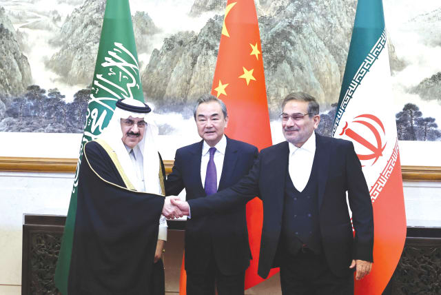  CHINA’S TOP diplomat, Wang Yi, flanked by senior security officials of Iran and Saudi Arabia, announces that the two countries have agreed to restore diplomatic relations, in Beijing, earlier this month.  (photo credit: CHINA DAILY VIA REUTERS)