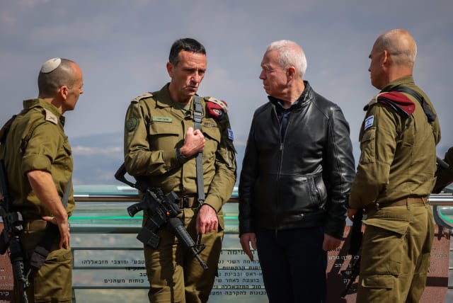 Minister of Defence Yoav Galant and  IDF Chief of Staff Herzi Halevi seen during a tour on near the border with Lebanon, northern Israel, March 16, 2023.  (photo credit: DAVID COHEN/FLASH 90)