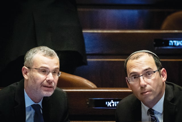  K SIMCHA ROTHMAN with Justice Minister Yariv Levin in the Knesset on Wednesday. (photo credit: YONATAN SINDEL/FLASH90)