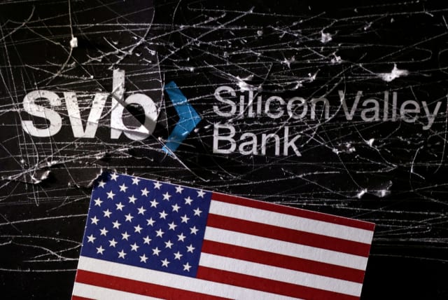  Destroyed SVB (Silicon Valley Bank) logo and U.S. flag is seen in this illustration taken March 13, 2023.  (photo credit: REUTERS/DADO RUVIC)