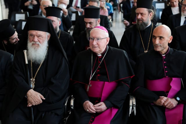  Greece's Orthodox Church, Ieronymos II and Bishop Brian Farrell, Secretary of the Pontifical Council for Promoting Christian Unity, attend a ceremony to mark the return of three Parthenon fragments from the Vatican, at the Parthenon Gallery of the Acropolis Museum, in Athens, Greece March 24, 2023. (photo credit: REUTERS/LOUIZA VRADI)