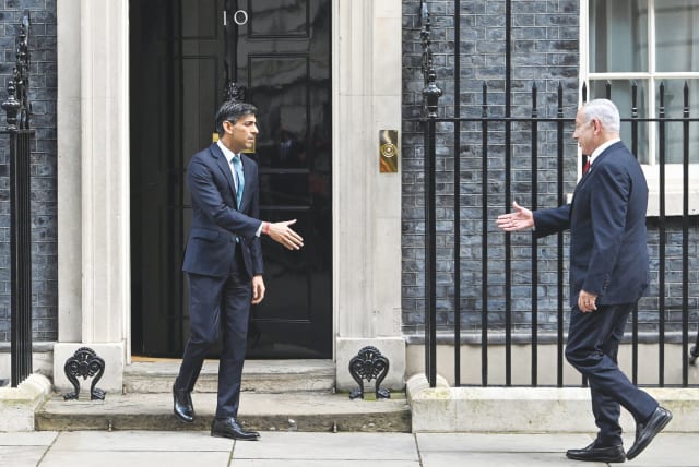  PRIME MINISTER Benjamin Netanyahu arrives at 10 Downing Street, where he is greeted by British Prime Minister Rishi Sunak, on Friday. The UK-Israel relationship has never been closer, says the writer.  (photo credit: TOBY MELVILLE/REUTERS)