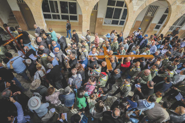  CHRISTIAN WORSHIPERS take part in a Good Friday procession in Jerusalem’s Old City. With the confluence of Passover, Easter and Ramadan earlier in 2023 (photo credit: JAMAL AWAD/FLASH90)