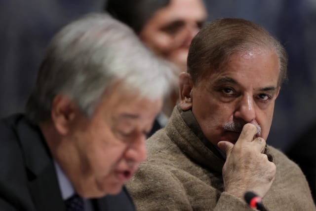  Pakistan's Prime Minister Shehbaz Sharif and United Nations Secretary General Antonio Guterres attend a summit on climate resilience in Pakistan, months after deadly floods in the country, at the United Nations, in Geneva, Switzerland, January 9, 2023.  (photo credit: DENIS BALIBOUSE/REUTERS)