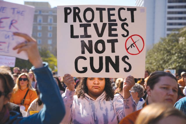  PROTESTERS GATHER outside the Tennessee State Capitol to call for an end to gun violence and stronger gun laws, after a deadly shooting at the Covenant School in Nashville, last month.  (photo credit: CHENEY ORR/REUTERS)