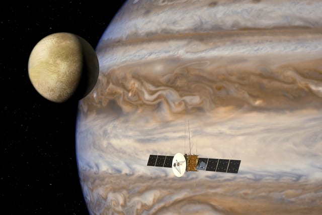  The JUpiter ICy moons Explorer mission, JUICE, is seen in this artist's impression handout from NASA. NASA has selected key contributions to a 2022 European Space Agency (ESA) mission that will study Jupiter and three of its largest moons in unprecedented detail.  (photo credit: REUTERS/NASA/ESA/AOES/Handout)