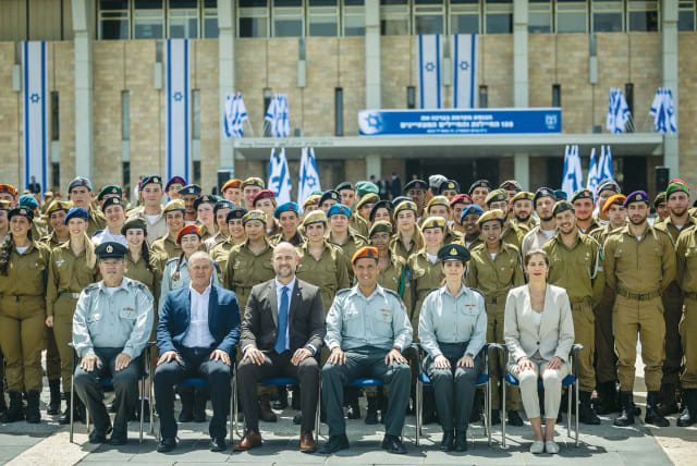  SPEAKER AMIR OHANA poses with outstanding soldiers in front of the Knesset building this week, ahead of Independence Day. How many Holocaust survivors still with us thought they would live to see this day? (photo credit: YONATAN SINDEL/FLASH90)