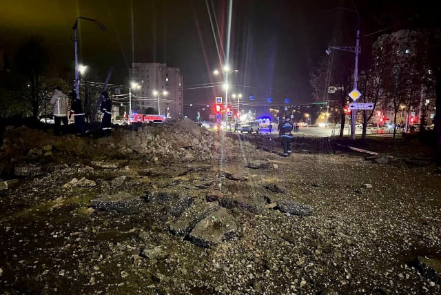  A view shows the accident scene following a large blast in a street in the city of Belgorod, Russia, April 20, 2023.  (photo credit: Mayor of Belgorod City Valentin Demidov via Telegram/Handout via REUTERS)
