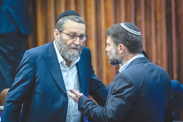  FINANCE MINISTER Bezalel Smotrich and United Torah Judaism MK Moshe Gafni confer in the Knesset plenum. (photo credit: YONATAN SINDEL/FLASH90)