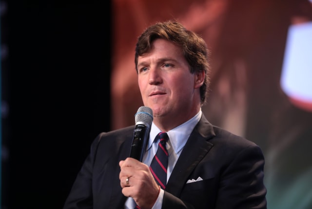  Tucker Carlson speaking with attendees at the 2018 Student Action Summit hosted by Turning Point USA at the Palm Beach County Convention Center in West Palm Beach, Florida. (photo credit: GAGE SKIDMORE/WIKIMEDIA COMMONS)