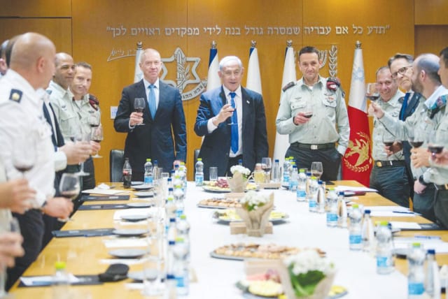  Prime Minister Benjamin Netanyahu with Defense Minister Yoav Gallant and IDF Chief of General Staff Lt.-Gen. Herzi Halevi at a toast with the IDF General Staff Forum on April 4. (photo credit: KOBI GIDEON/GPO)