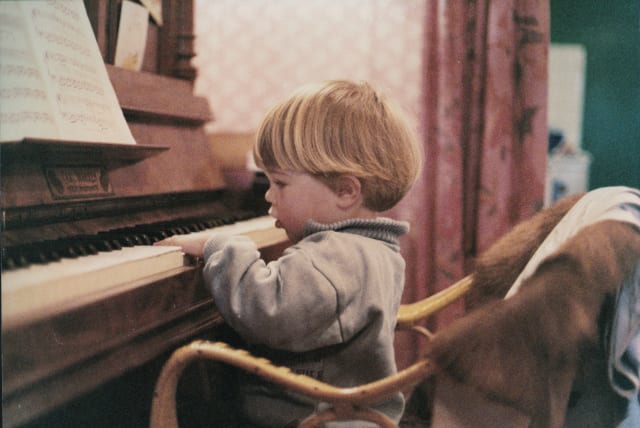  Child playing piano (illustrative). (photo credit: Wikimedia Commons)