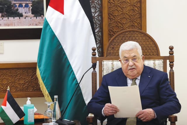  PA HEAD Mahmoud Abbas told Maher Yunis: ‘We are proud of you... You are the beacon of light of this nation. (photo credit: Ronaldo Schemidt/Reuters)