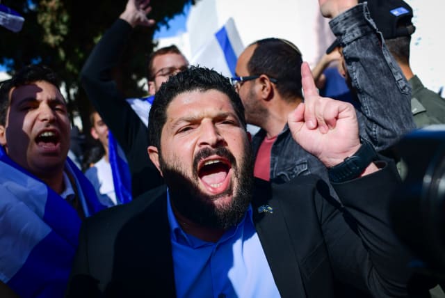   Otzma Yehudit MK Almog Cohen and right wing activists protest against a demonstration of Israeli-Arab students and activists against the Israeli army operation in Jenin, at the Tel Aviv University on January 30, 2023.  (photo credit: TOMER NEUBERG/FLASH90)