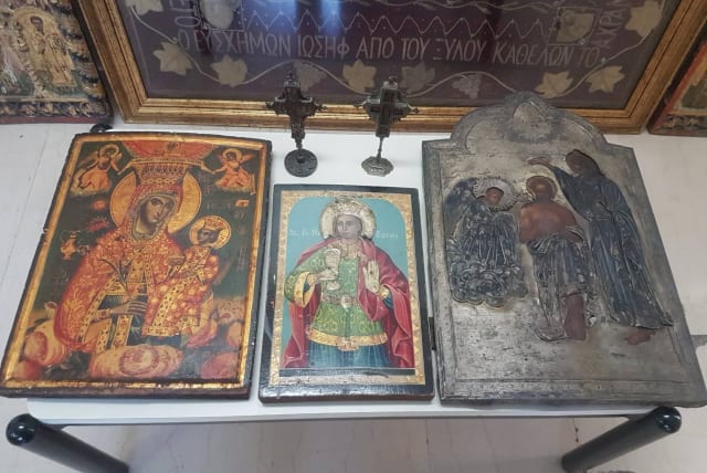 A view of several religious icons that were among the stolen artefacts that were recovered during a crackdown on international art trafficking, at an unknown location, in Greece, in this undated handout picture obtained by Reuters on May 4, 2023 (photo credit: Courtesy of Europol/Handout via REUTERS )