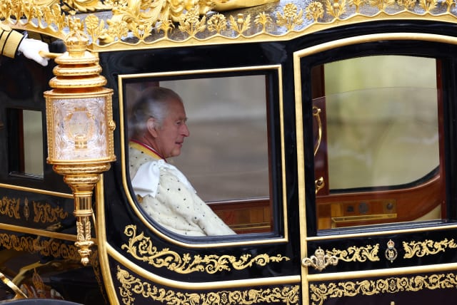  Britain's King Charles travels in the Diamond Jubilee State Coach from Buckingham Palace to Westminster Abbey to his (their) coronation ceremony in London, Britain May 6, 2023. (photo credit: REUTERS/HANNAH MCKAY)