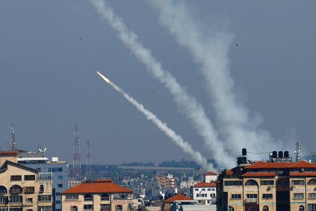  ROCKETS ARE fired from Gaza into Israel on Wednesday. (photo credit: MOHAMMED SALEM/REUTERS)