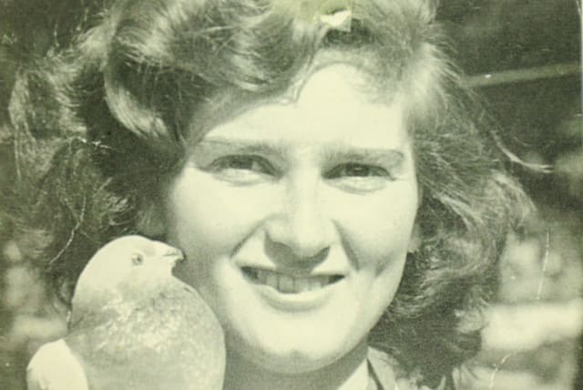  YEHUDIT ENTIN with a messenger pigeon. (photo credit: Uri Bareket/The National Library of Israel)