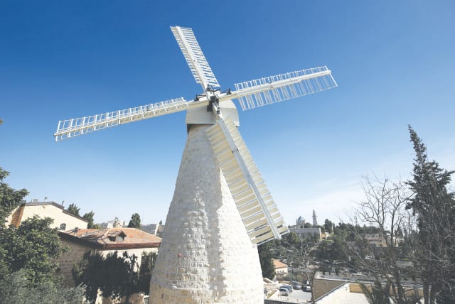  A 2015 photo of the windmill in the Yemin Moshe neighborhood, in Jerusalem. In 1857, Moses Montefiore left his mark on the neighborhood located outside the walls of Jerusalem’s Old City: the windmill. (photo credit: NATI SHOHAT/FLASH90)