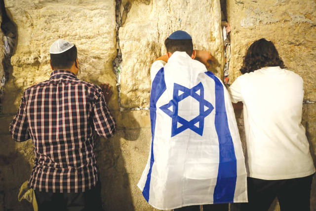  JERUSALEM DAY, last year: Your ancestors could only pray in the direction of Jerusalem. You can now put your hands on the stones of the Western Wall (photo credit: NOAM REVKIN FENTON/FLASH90)