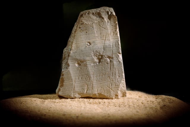  The inscription carrying the financial record that was found in the City of David in Jerusalem. (photo credit: ELIYAHU YANAI/CITY OF DAVID)