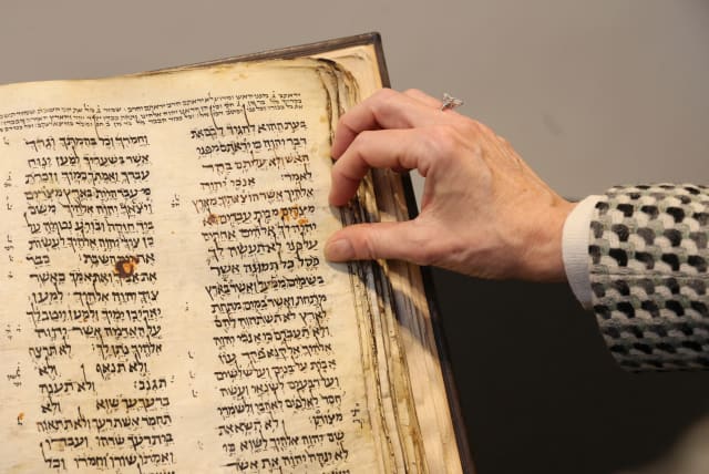  The Codex Sassoon, the earliest and most complete Hebrew Bible ever discovered which is estimated to sell for between $30 million and $50 million, is displayed at Sotheby's in New York City, New York US, February 15, 2023.