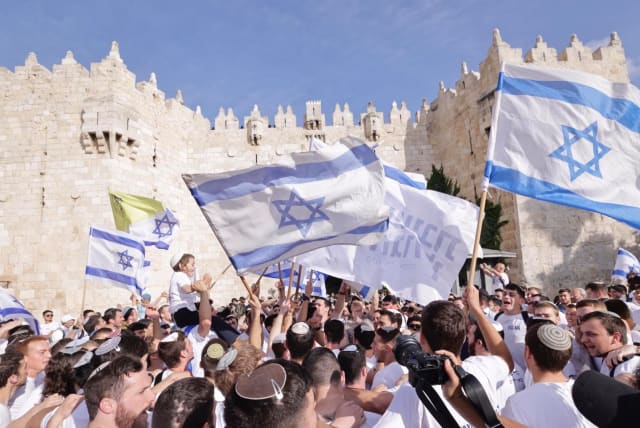  The Jerusalem Day flag march in front of the Damascus Gate, May 18, 2023 (photo credit: MARC ISRAEL SELLEM)