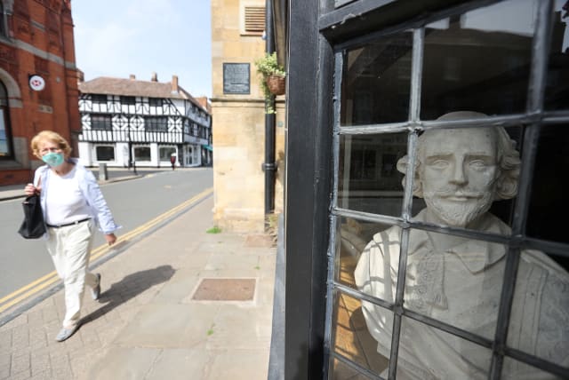  A BUST of the Bard peeks out of a Stratford-upon-Avon hotel, Britain. Will this new Haggadah raise questions about antisemitism in Shakespearean England?  (photo credit: Carl Recine/Reuters)