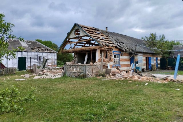  A view shows damaged buildings, after anti-terrorism measures introduced for the reason of a cross-border incursion from Ukraine were lifted, in what was said to be a settlement in the Belgorod region, in this handout image released May 23, 2023. (photo credit: Governor of Russia's Belgorod Region Vyacheslav Gladkov via Telegram/Handout via REUTERS)