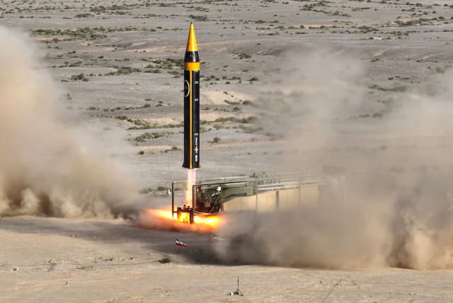 A new surface-to-surface 4th generation Khorramshahr ballistic missile called Khaibar with a range of 2,000 km is launched at an undisclosed location in Iran, in this picture obtained on May 25, 2023. (photo credit: IRANIAN DEFENSE MINISTRY/WANA/VIA REUTERS)