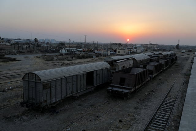  Train cars are seen at the railway station in Mosul, Iraq, July 4, 2021.  (photo credit: REUTERS/ABDULLAH RASHID)