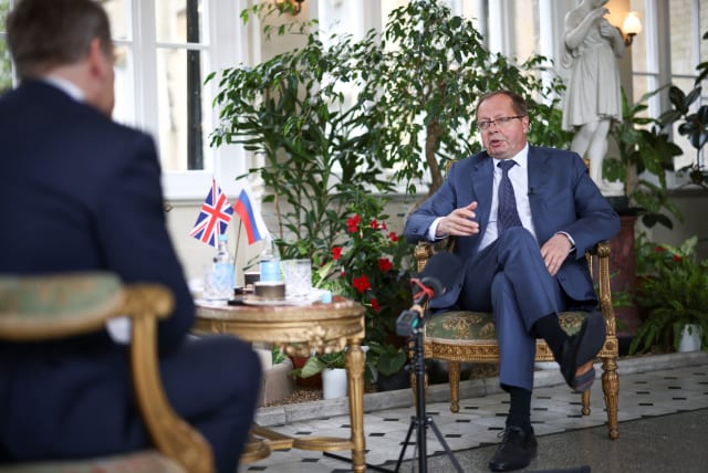  Ambassador of Russia to the United Kingdom Andrei Kelin speaks during an interview with Reuters, inside the residence of the Russian Ambassador, in London, Britain, May 20, 2021 (photo credit: REUTERS/HENRY NICHOLLS)