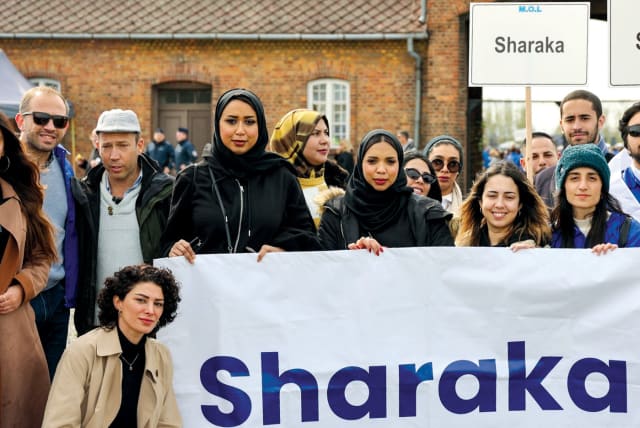  A delegation of Arab influencers from Sharaka gather at March of the Living in Poland in April.  (photo credit: Sharaka)