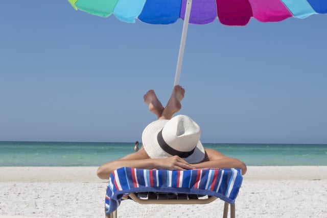  Illustrative image of a person on a beach. (photo credit: PIXABAY)
