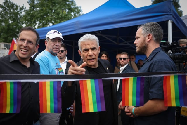  Opposition leader Yair Lapid attends at the annual Jerusalem Pride Parade, on June 1, 2023 (photo credit: YONATAN SINDEL/FLASH90)