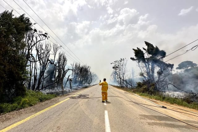  A KKL-JNF worker at the scene preventing the spread of the forest fire June 2, 2023. (photo credit: KKL-JNF)