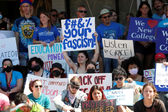  Students from New College of Florida stage a walkout from the public liberal arts college to protest against a proposed wide-reaching legislation that would ban gender studies majors and diversity programs at Florida universities, in Sarasota, Florida, U.S., February 28, 2023. (photo credit: REUTERS/OCTAVIO JONES/FILE PHOTO)