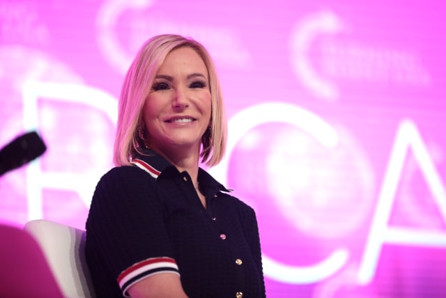 Pastor Paula White Cain speaking with attendees at the 2021 Young Women's Leadership Summit hosted by Turning Point USA at the Gaylord Texan Resort & Convention Center in Grapevine, Texas. (photo credit: Wikimedia Commons)