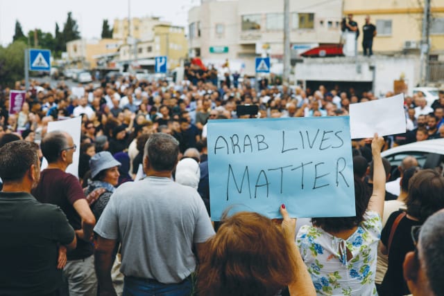  A PROTEST against rampant violence in the Arab sector takes place following shooting attacks, in Nazareth, last week.  (photo credit: AMMAR AWAD/REUTERS)