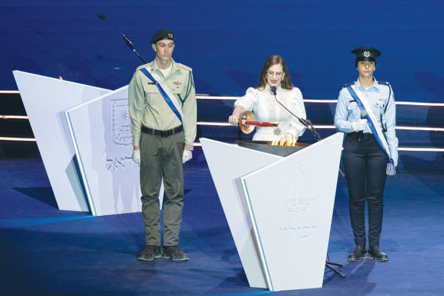  YAEL SHERER, a survivor of domestic sexual abuse and founder of the Lobby for the Fight Against Sexual Violence, was one of the torchlighters at the Independence Day ceremony on Mount Herzl last year. (photo credit: YONATAN SINDEL/FLASH90)