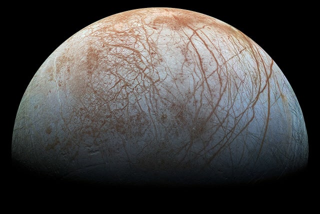  The puzzling, fascinating surface of Jupiter's icy moon Europa looms large in this newly-reprocessed color view, made from images taken by NASA's Galileo spacecraft in the late 1990s. (photo credit: Wikimedia Commons)