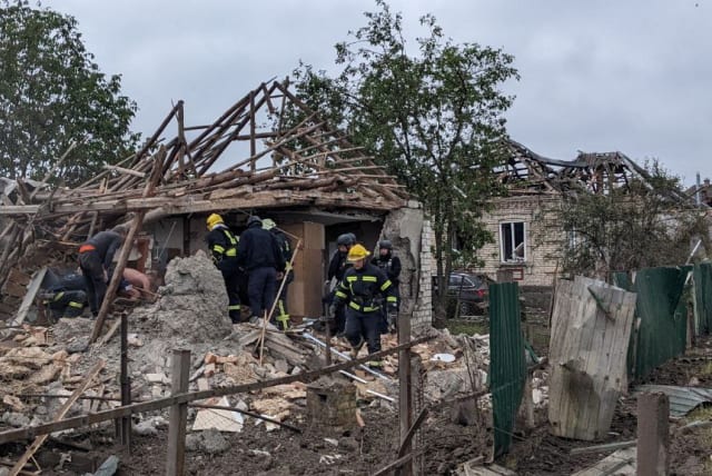  Rescuers work at the site of residential houses heavily damaged by a Russian missile strike, amid Russia's attack on Ukraine, in Kramatorsk, Donetsk region, Ukraine June 14, 2023.  (photo credit: Press service of the Ukrainian State Emergency Service/Handout via REUTERS)